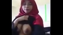 Big Busty Malay Woman Strips for the Camera tudung